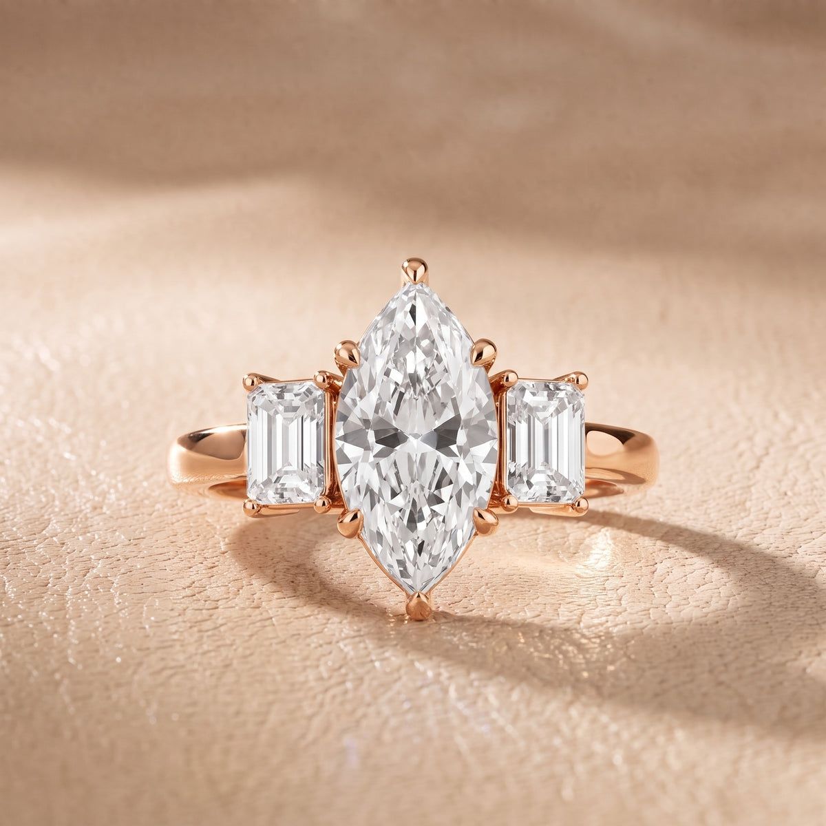 Zoe Three-Stone Marquise Diamond Engagement Ring in Rose Gold - front.jpg