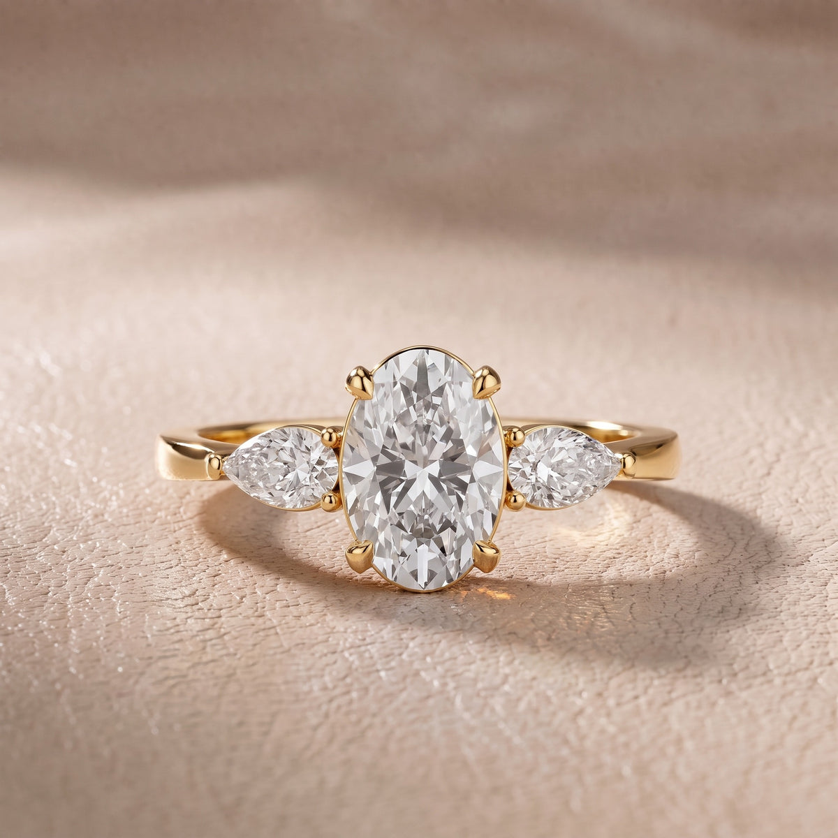 Grace Three Stone Oval Diamond Engagement Ring in Yellow Gold - front.jpg