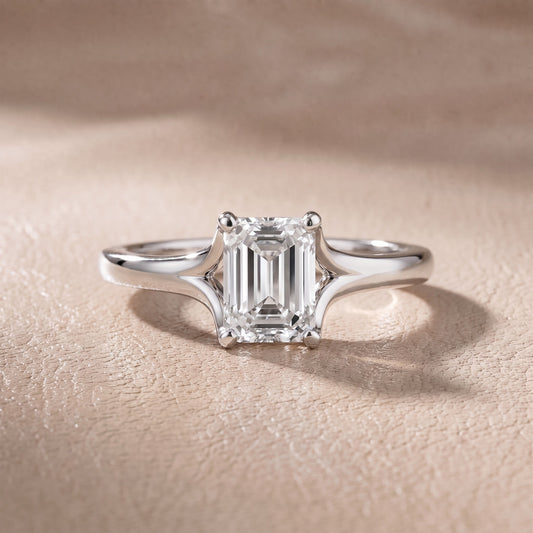 Nell Split Shank Solitaire Emerald Diamond Engagement Ring in Platinum - front.jpg