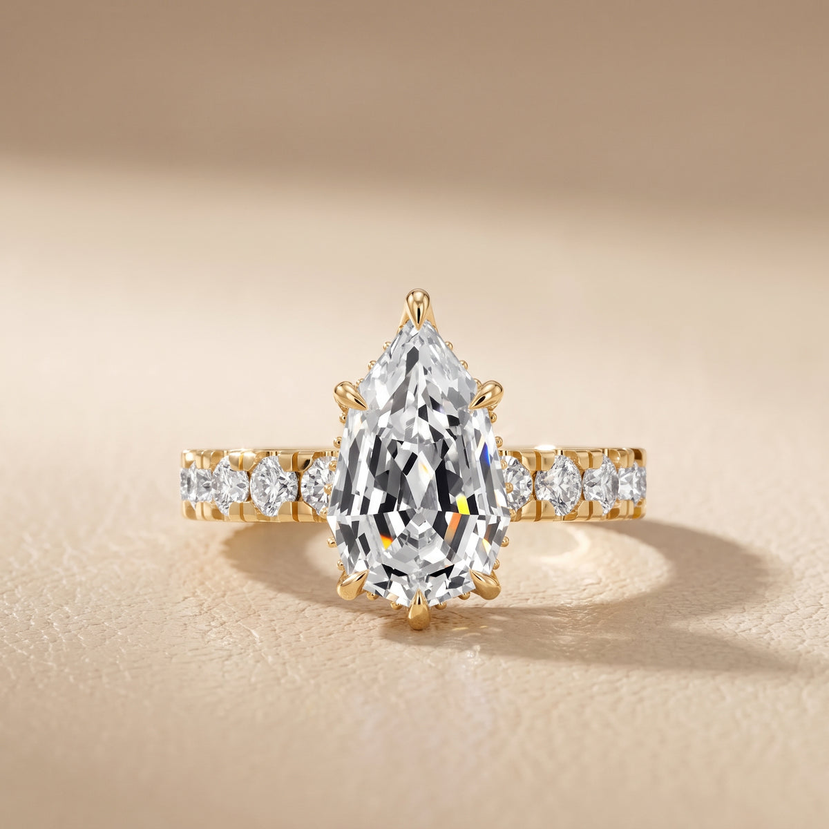 Delaney Hidden Halo French Pavé Step Cut Pear Diamond Engagement Ring in Yellow Gold - front.jpg