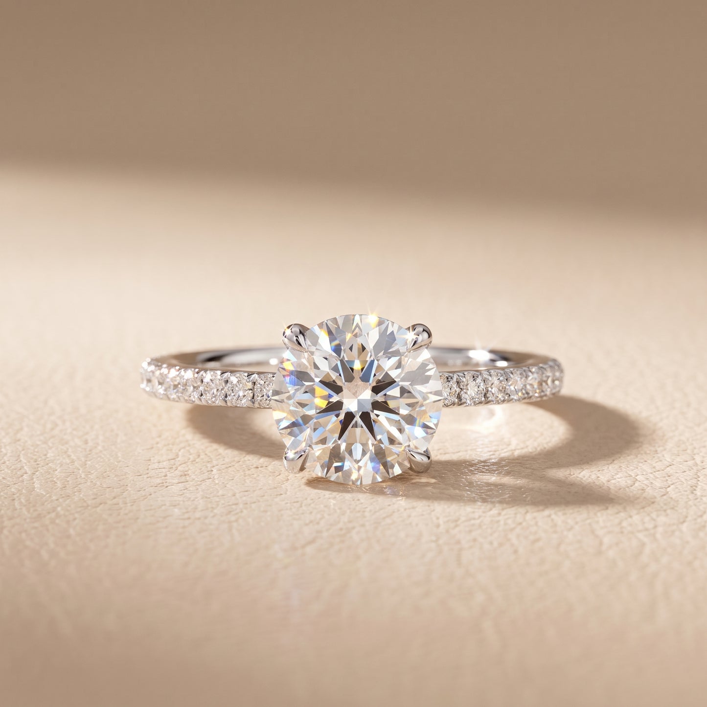 Ione Solitaire Pavé Round Diamond Engagement Ring in Platinum - front.jpg