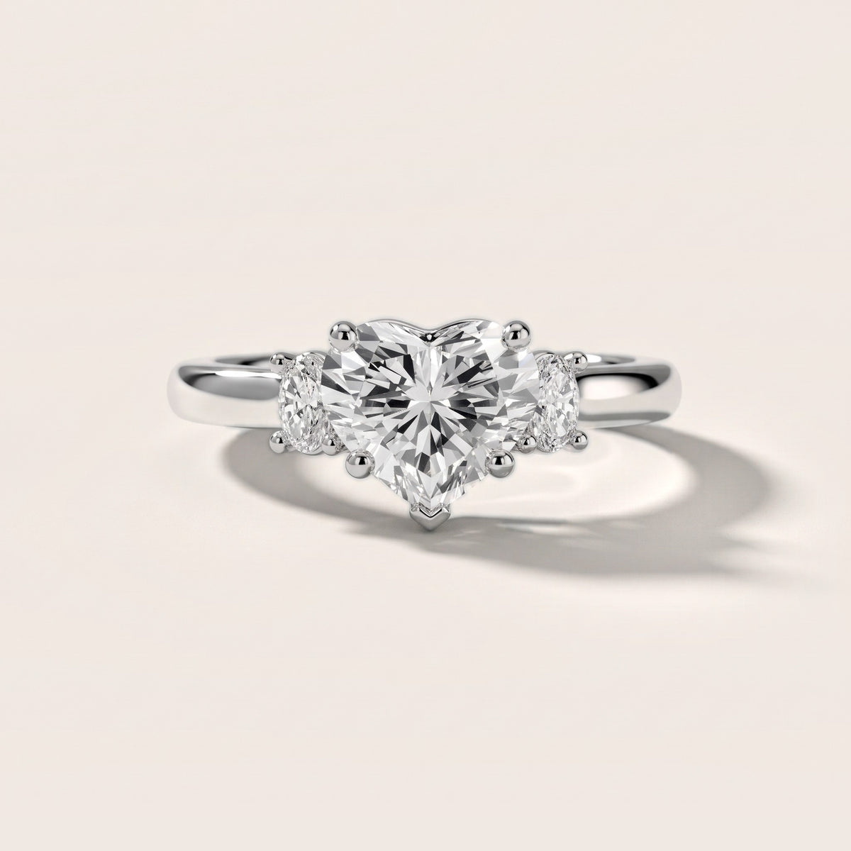 Alya Three-Stone Cathedral Heart Diamond Engagement Ring in Platinum - front.jpg