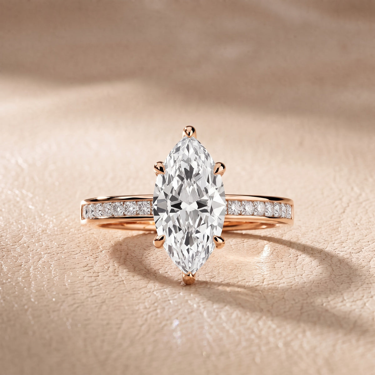 Maren Sidestone Channel Set Marquise Diamond Engagement Ring in Rose Gold - front.jpg