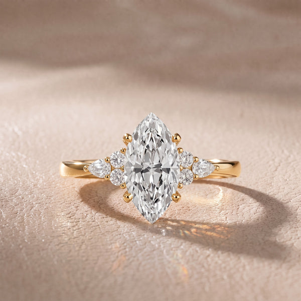 Amelia Three Stone Marquise Diamond Engagement Ring in Yellow Gold