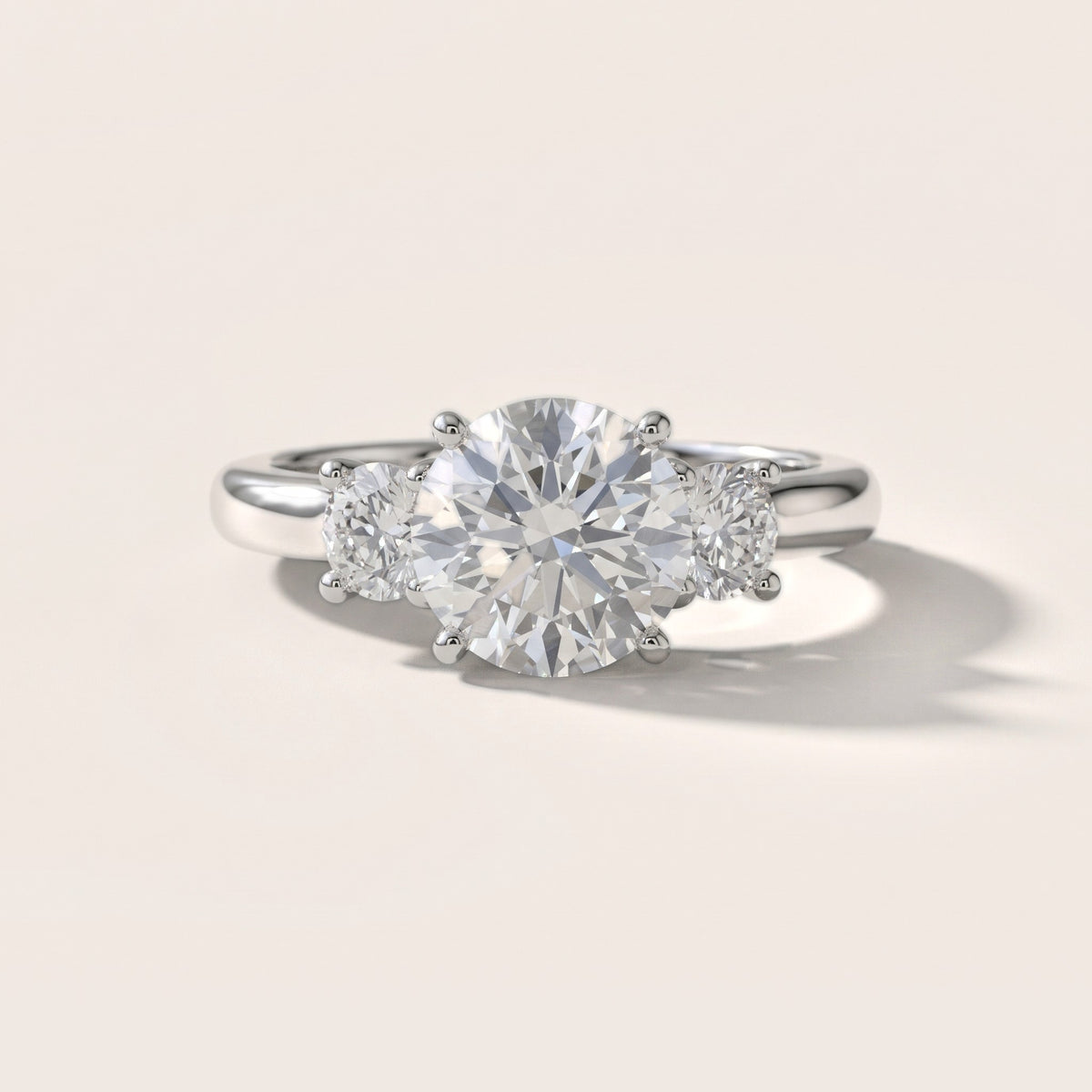 Natalia Three-Stone Cathedral Round Diamond Engagement Ring in Silver - front.jpg