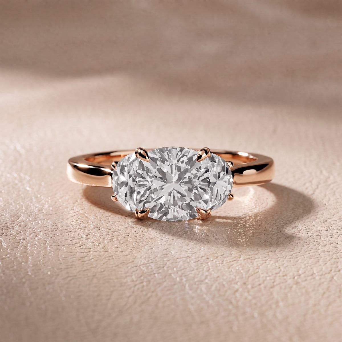Romy Three-Stone Cushion Diamond Engagement Ring in Rose Gold - front.jpg