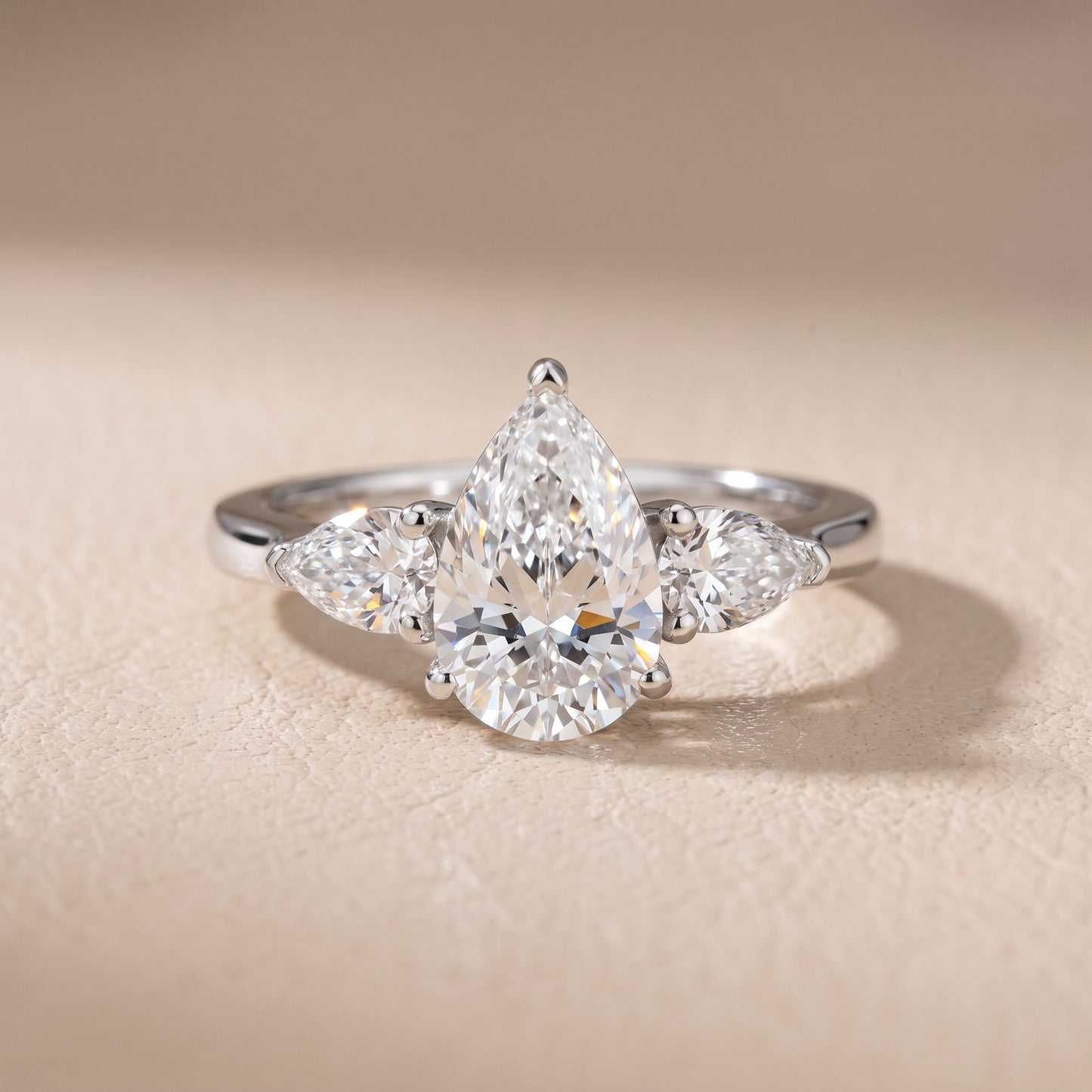Mirabel Three-Stone Pear Diamond Engagement Ring in Silver - front.jpg