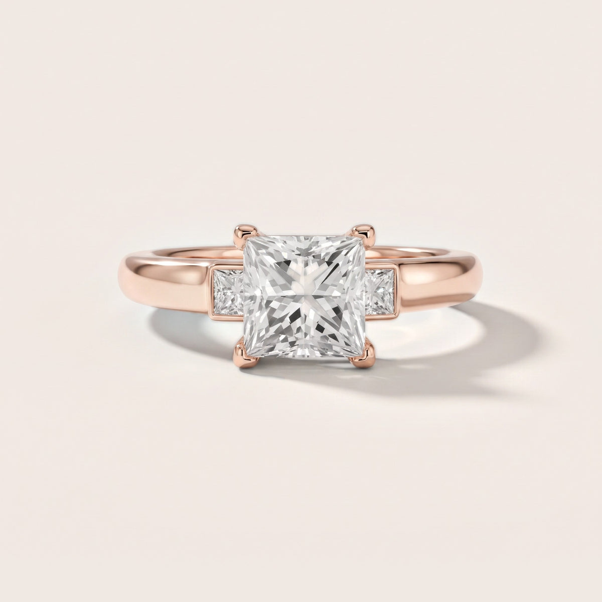 Penny Crossover Three-Stone Princess Diamond Engagement Ring in Rose Gold - front.jpg