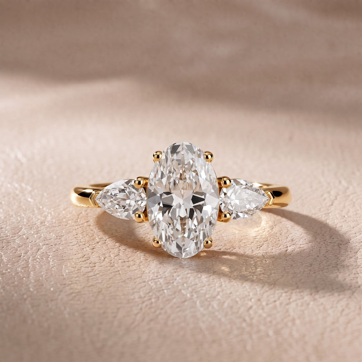 Sophia Three-Stone Oval Diamond Engagement Ring in Yellow Gold - front.jpg