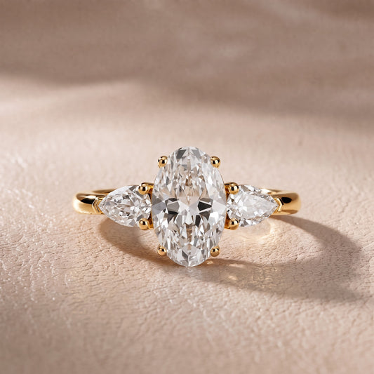 Sophia Three-Stone Oval Diamond Engagement Ring in Yellow Gold - front.jpg