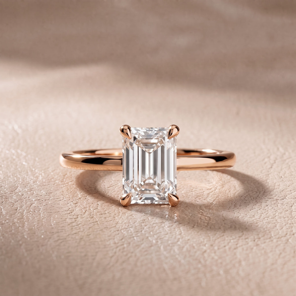 Nella Petite Solitaire Emerald Diamond Engagement Ring in Rose Gold - front.jpg