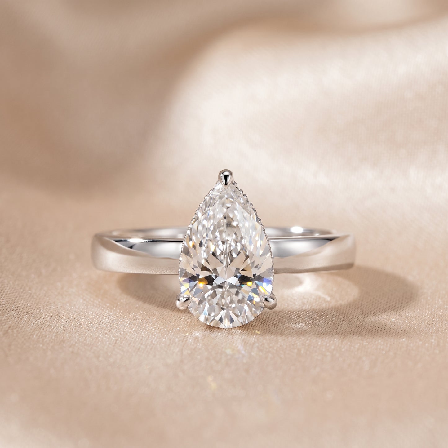 Lara Hidden Halo Pear Diamond Engagement Ring in Platinum - front.jpg