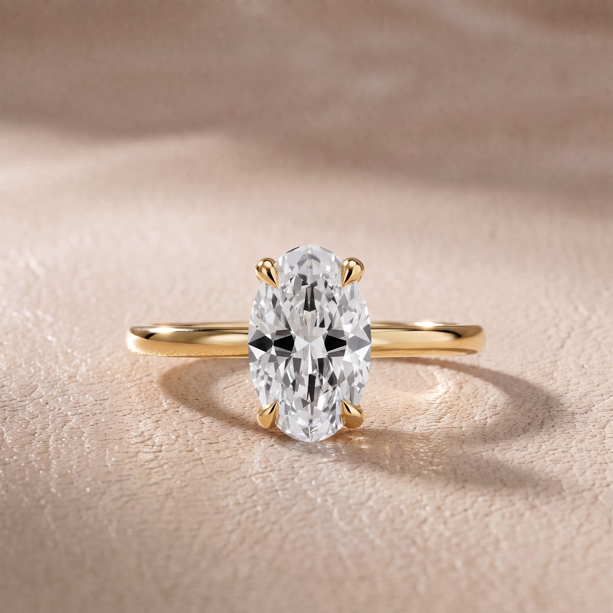 Nella Petite Solitaire Oval Diamond Engagement Ring in Yellow Gold - front.jpg