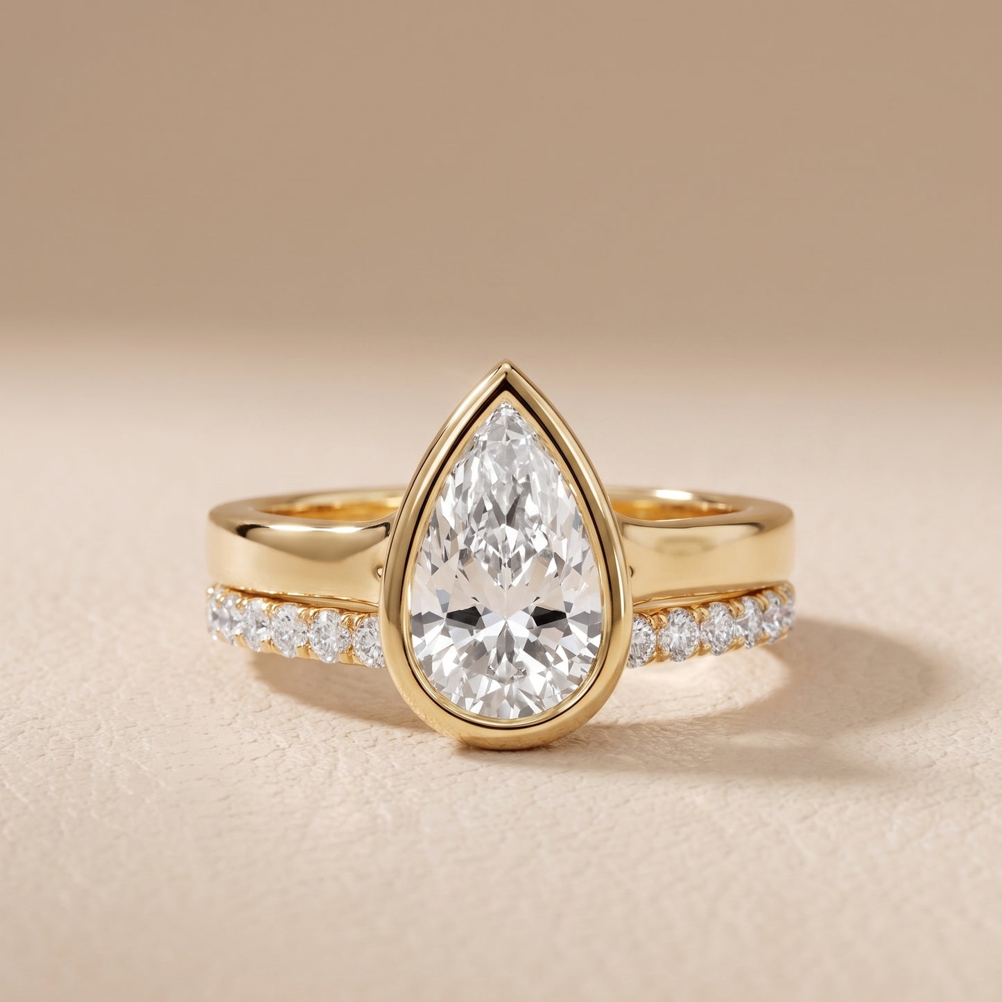 Ayla Bezel Bypass Pear Diamond Ring in Yellow Gold - front.jpg