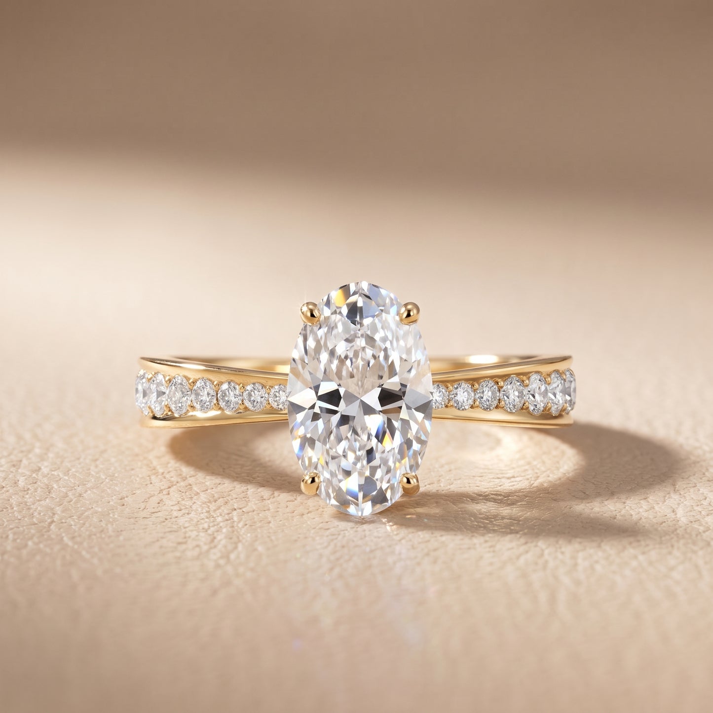 Rhea Sidestone Pavé Oval Diamond Engagement Ring in Yellow Gold - front.jpg