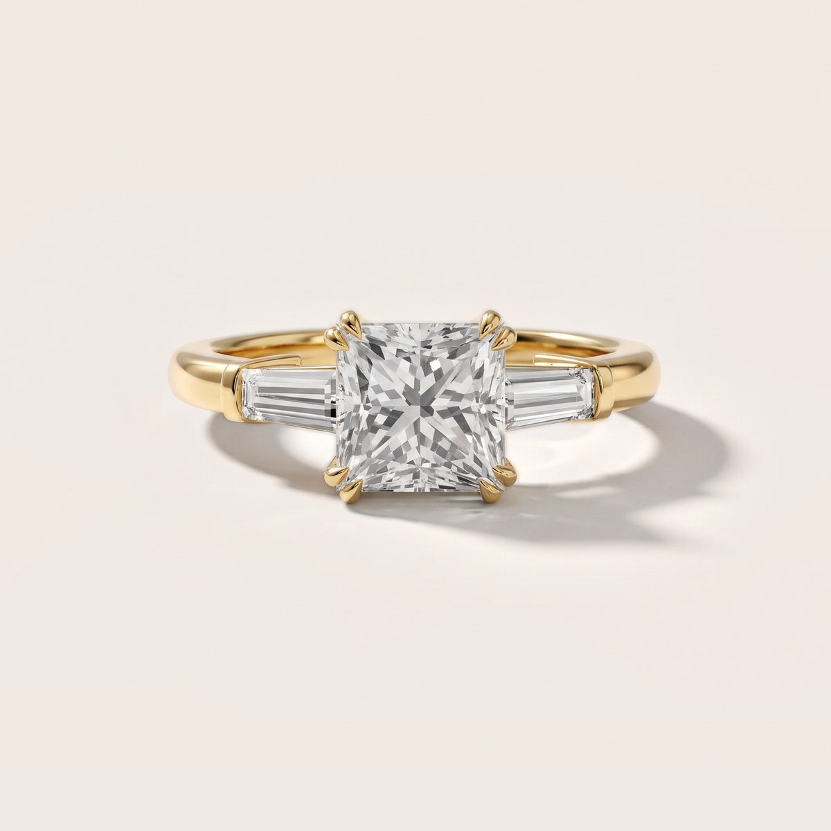 Betsy Baguette Three-Stone Princess Diamond Engagement Ring in Yellow Gold - front.jpg
