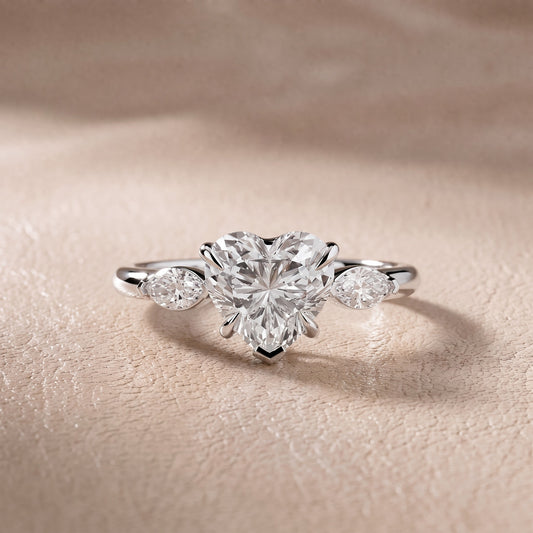 Lyra Three-Stone Heart Diamond Engagement Ring in Platinum - front.jpg