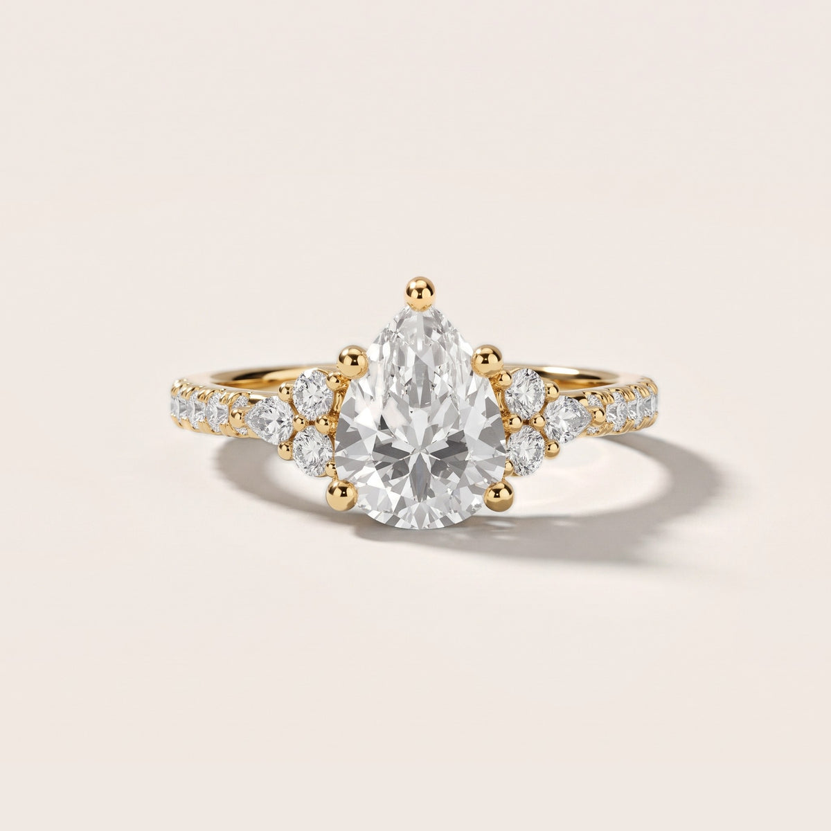 Alta Pavé Cluster Pear Diamond Engagement Ring in Yellow Gold - front.jpg