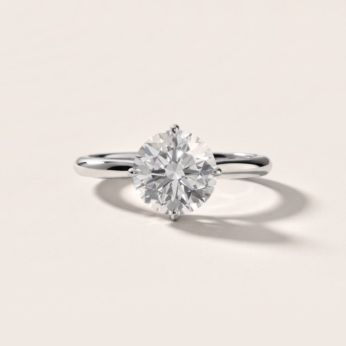 Ginette Solitaire Knife Edge Round Diamond Engagement Ring in White Gold - front.jpg