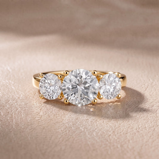 Callie Three-Stone Trellis Round Diamond Engagement Ring in Yellow Gold - front.jpg