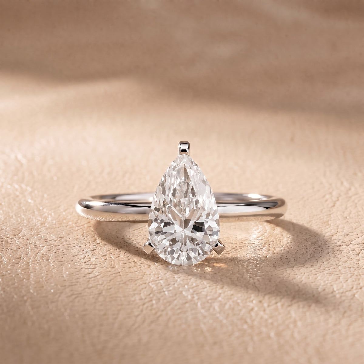 Arabella Six-Prong Solitaire Pear Diamond Engagement Ring in Silver - front.jpg