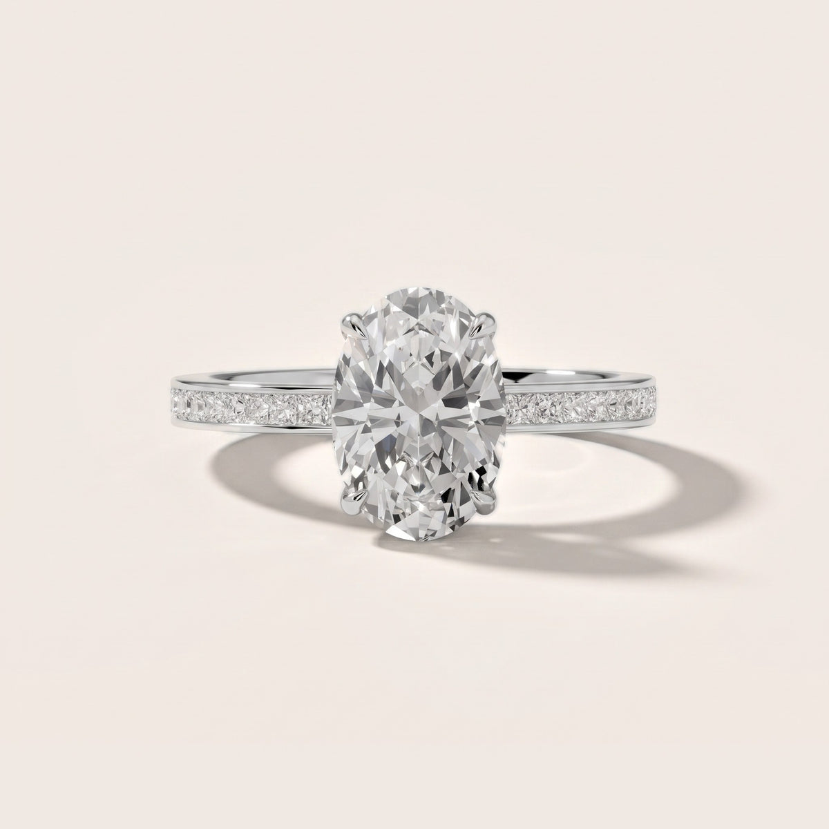 Freja Channel Set Oval Diamond Engagement Ring in Platinum - front.jpg