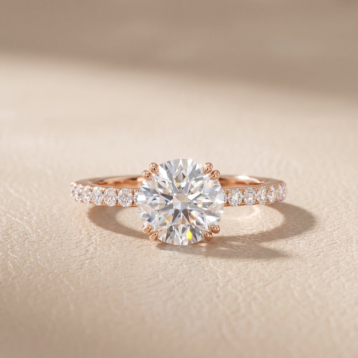 Novara Solitaire Pavé Round Diamond Ring in Rose Gold - front.jpg