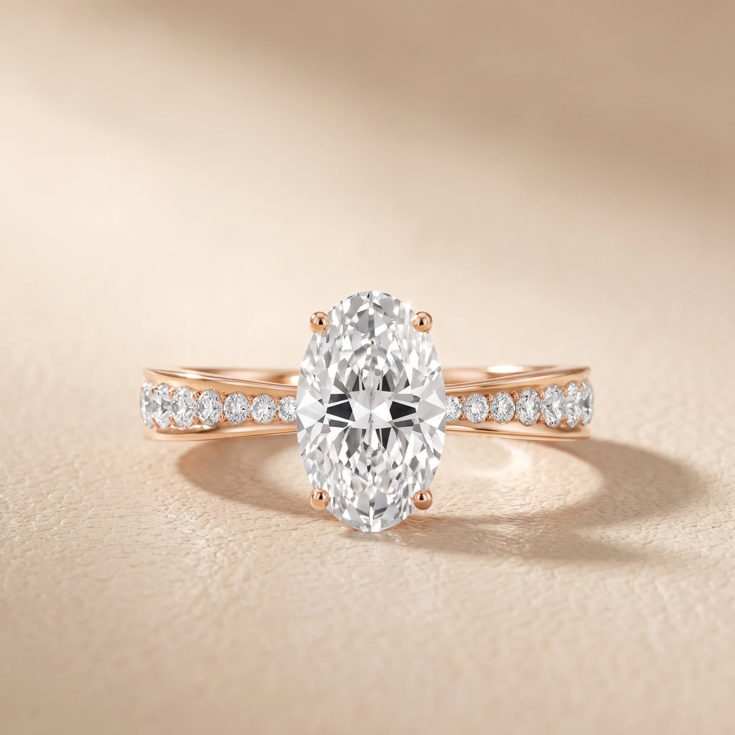 Rhea Sidestone Pavé Oval Diamond Engagement Ring in Rose Gold - front.jpg
