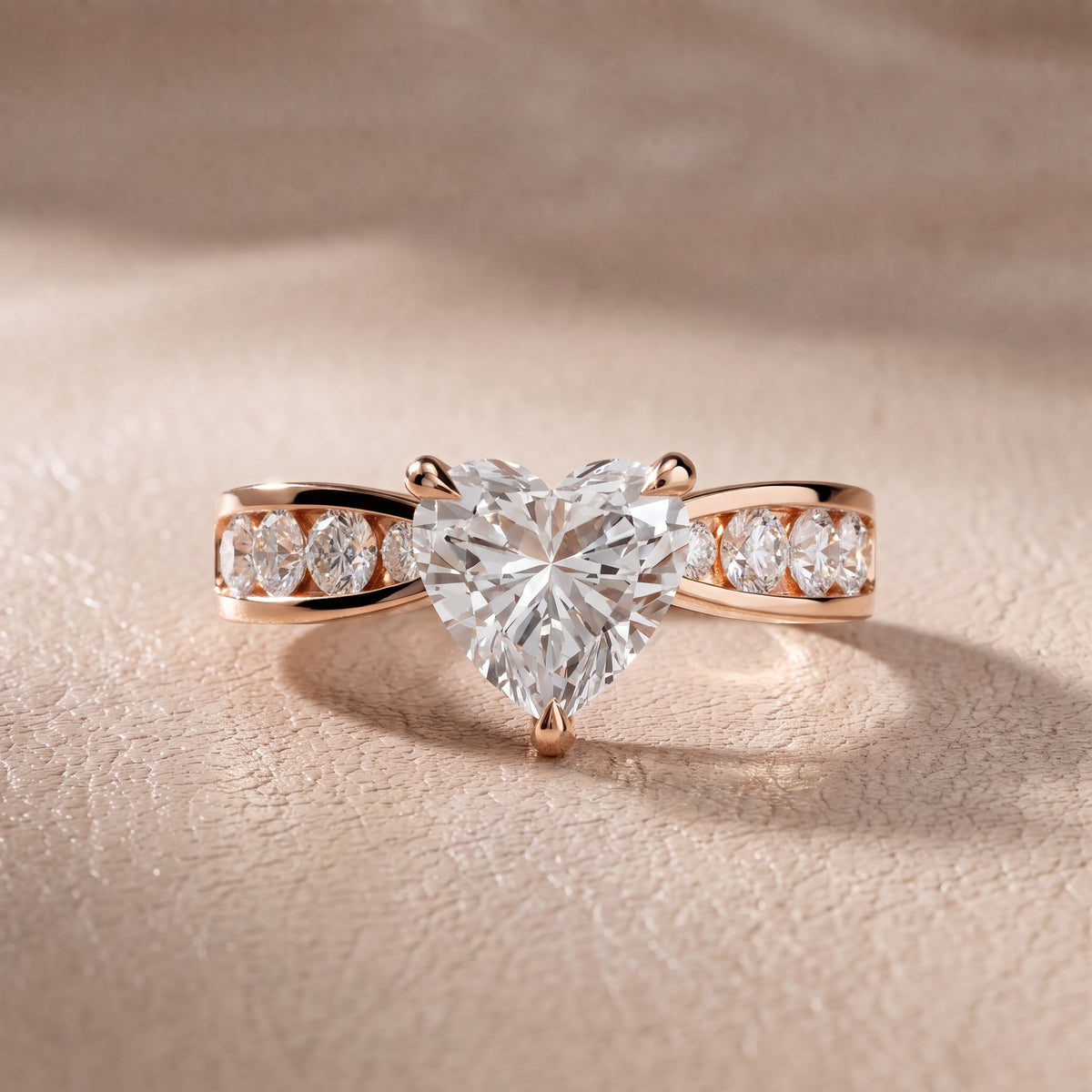 Rosalie Channel Set Sidestone Heart Diamond Engagement Ring in Rose Gold - front.jpg