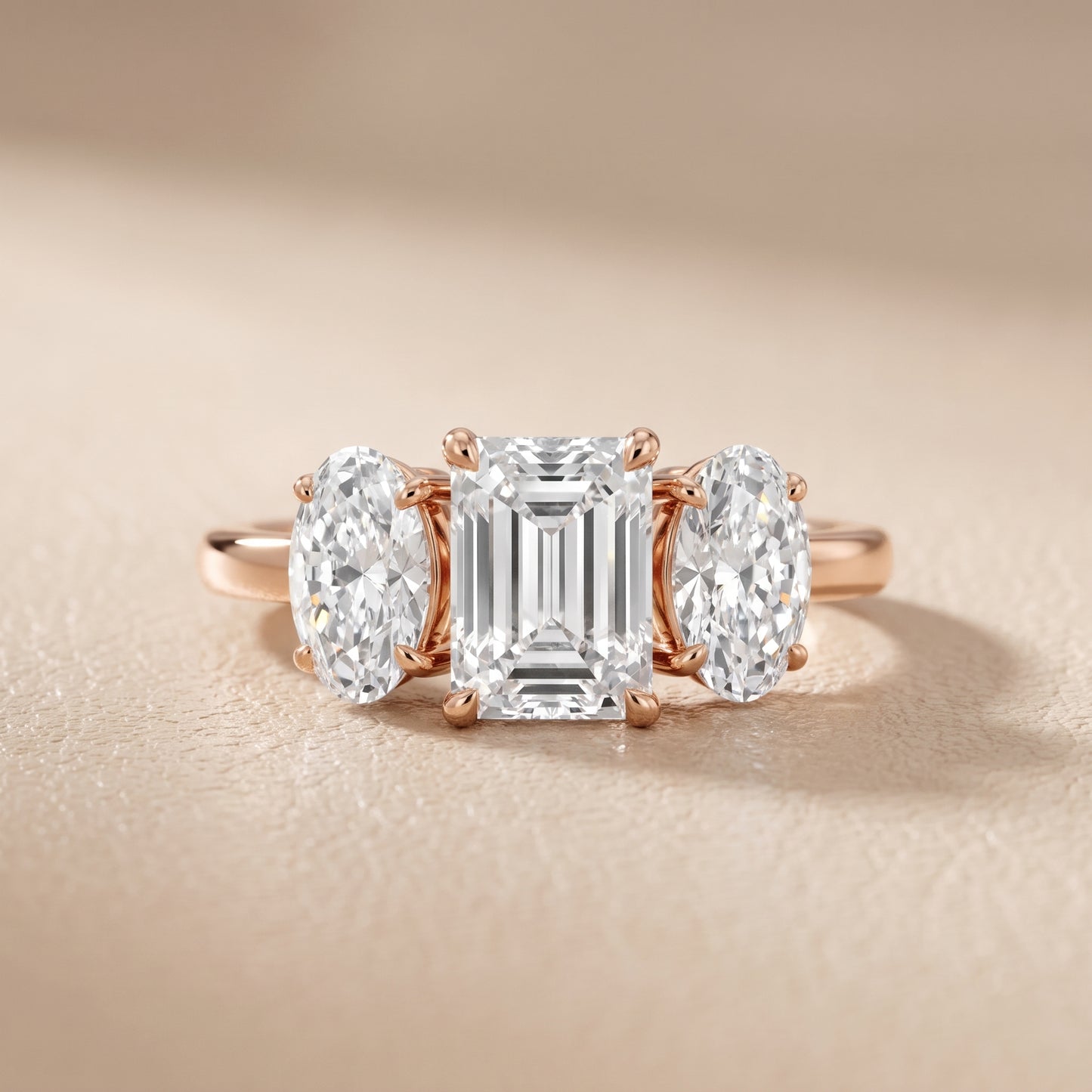 Lila Three-Stone Emerald Diamond Ring in Rose Gold - front.jpg