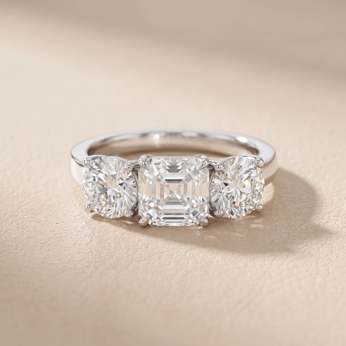 Esme Three-Stone Tapered Asscher Diamond Ring in Platinum - front.jpg