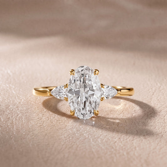 Leila Three-Stone Oval Diamond Engagement Ring in Yellow Gold - front.jpg