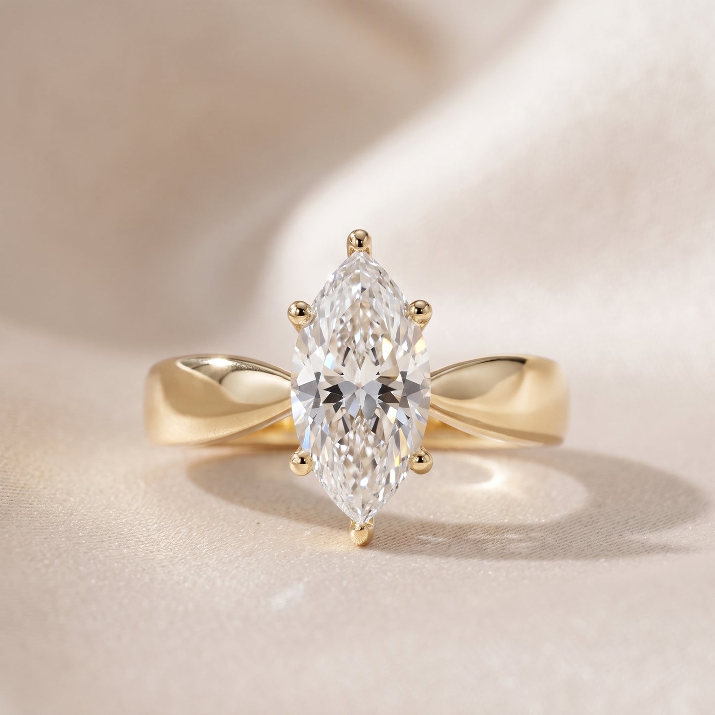 Talia Solitaire Twist Marquise Diamond Engagement Ring in Yellow Gold - front.jpg