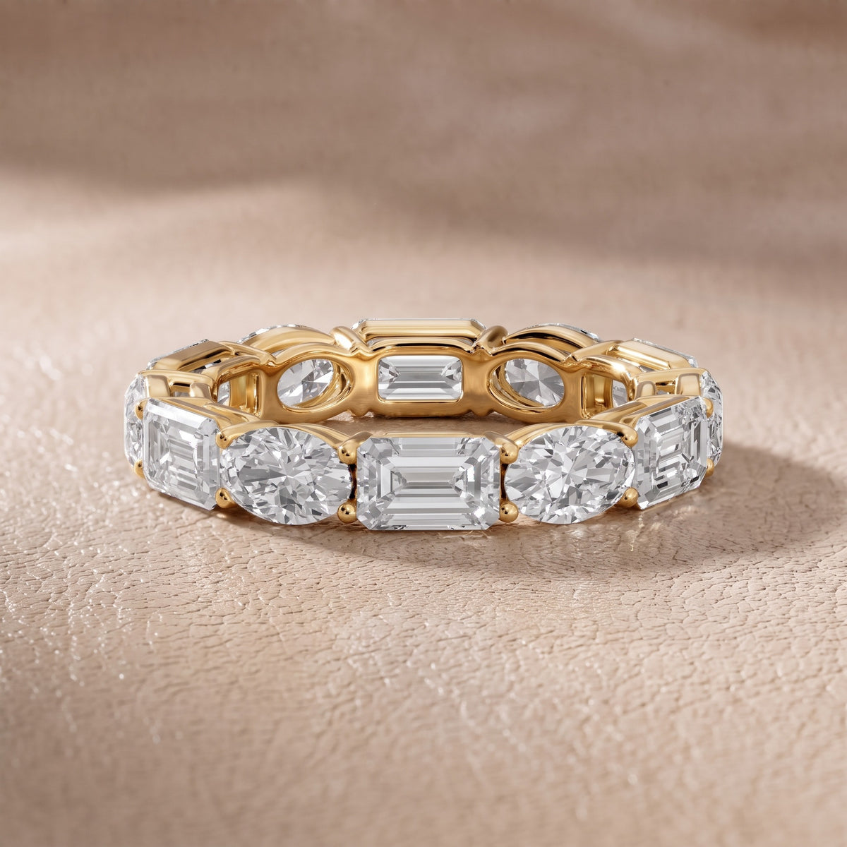 Avery Shared Prong Emerald & Oval Diamond Eternity Band in Yellow Gold - front.jpg