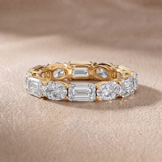 Avery Shared Prong Emerald & Oval Diamond Eternity Band in Yellow Gold - front.jpg