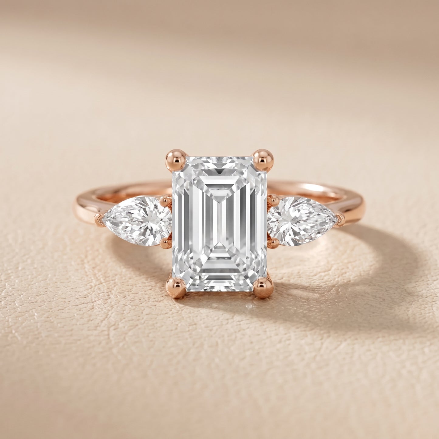 Faye Three-Stone Trellis Emerald Diamond Ring in Rose Gold - front.jpg