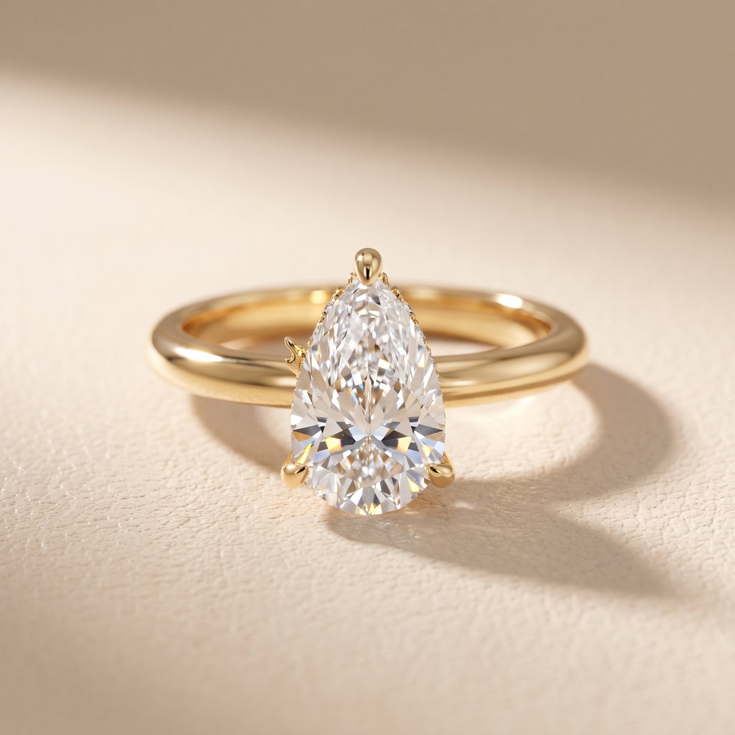 Amaya Hidden Halo Pear Diamond Ring in Yellow Gold - front.jpg