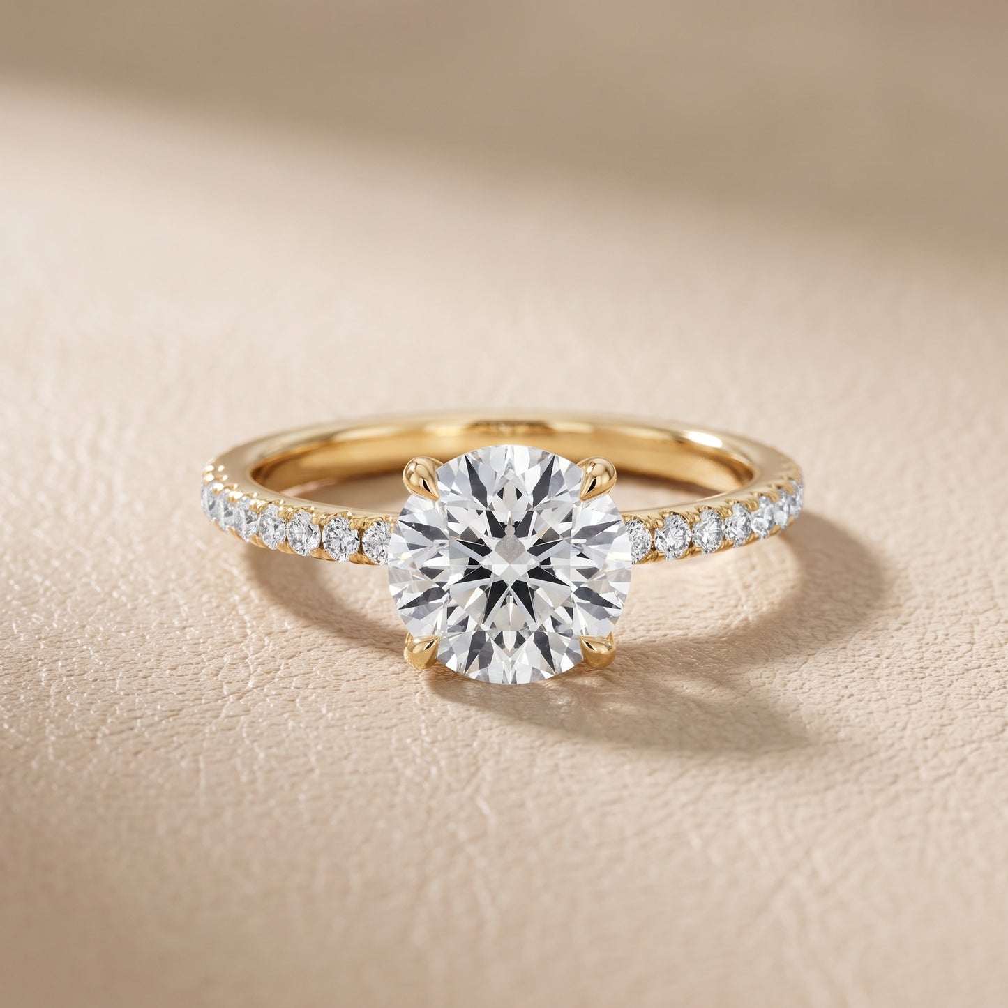 Ione Solitaire Pavé Round Diamond Engagement Ring in Yellow Gold - front.jpg