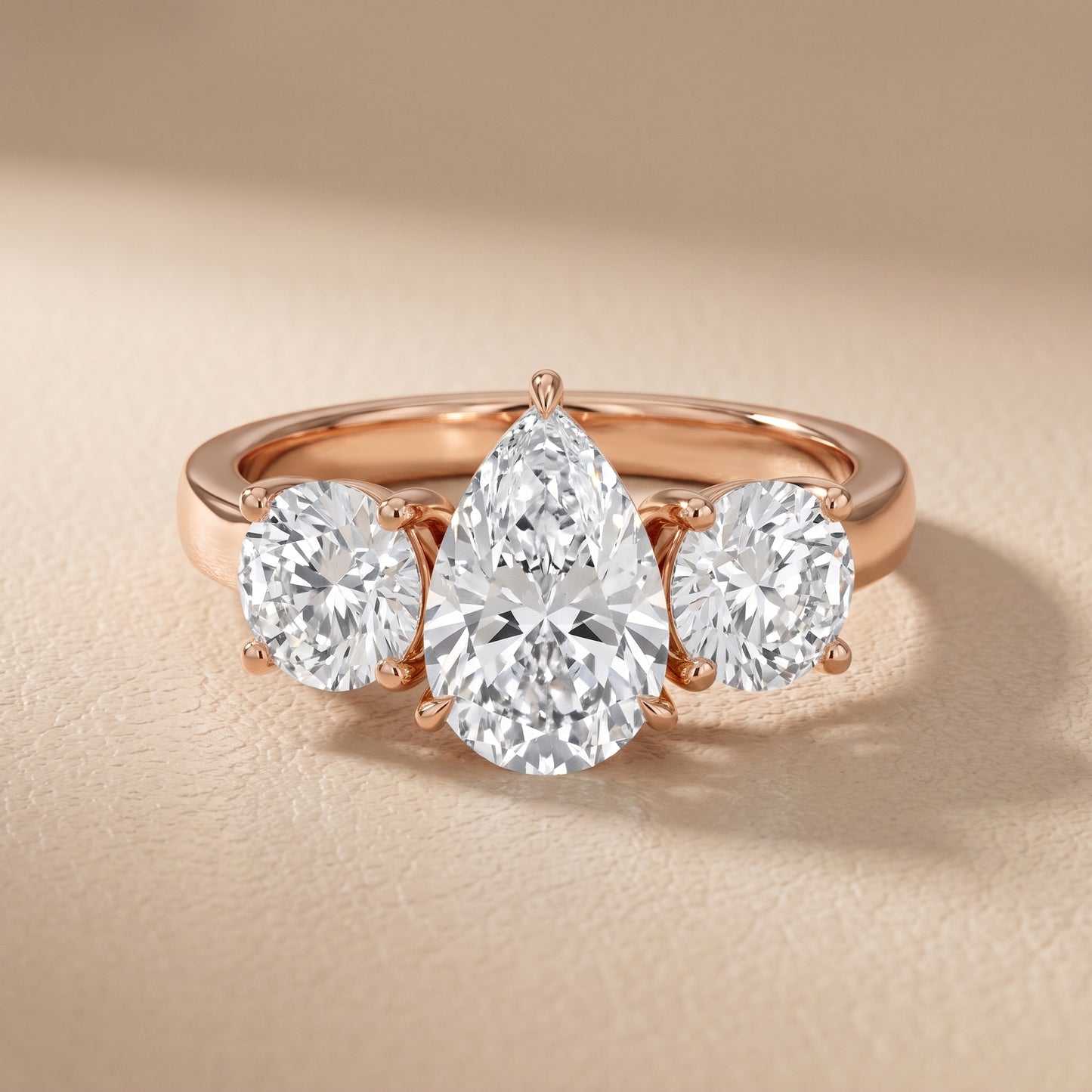 Esme Three-Stone Tapered Pear Diamond Ring in Rose Gold - front.jpg