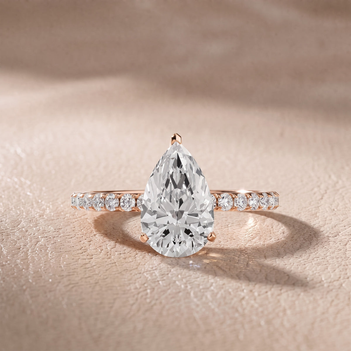 Juna French Pavé Solitaire Pear Diamond Engagement Ring in Rose Gold - front.jpg