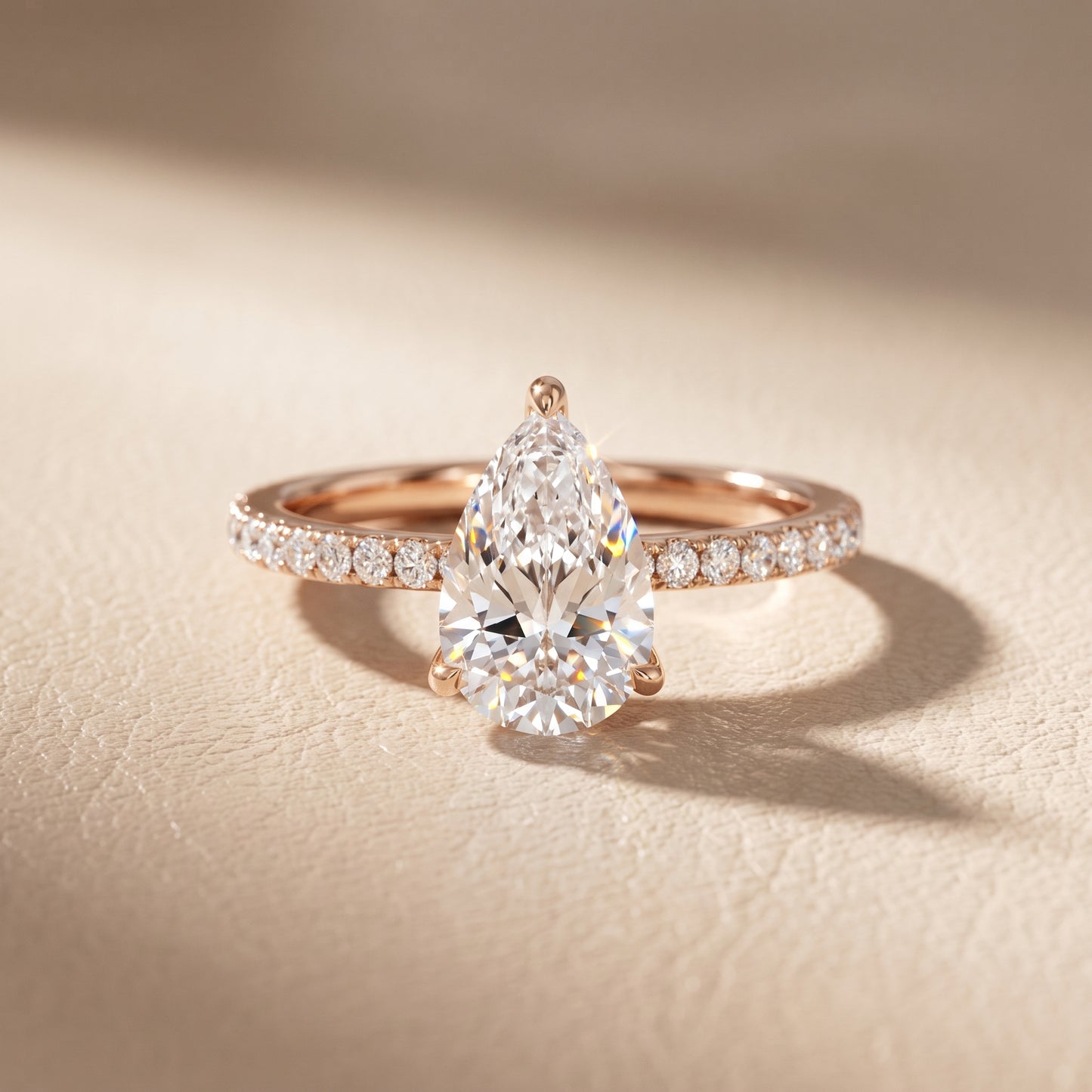 Ione Solitaire Pavé Pear Diamond Engagement Ring in Rose Gold - front.jpg