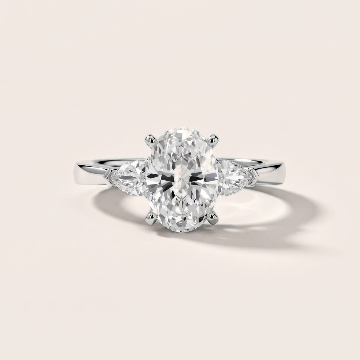 Amabel Three-Stone Oval Diamond Engagement Ring in Silver - front.jpg