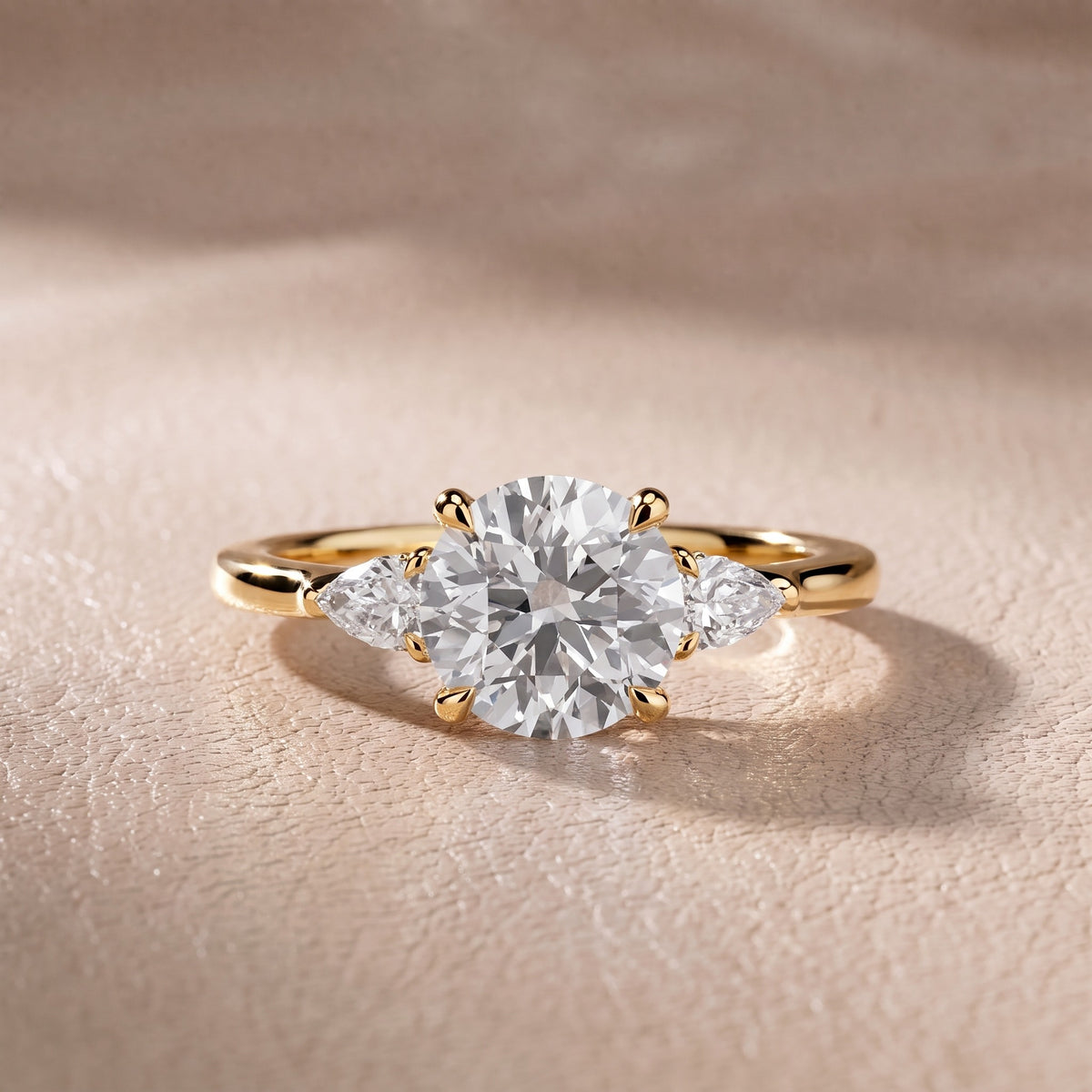 Leila Three-Stone Round Diamond Engagement Ring in Yellow Gold - front.jpg
