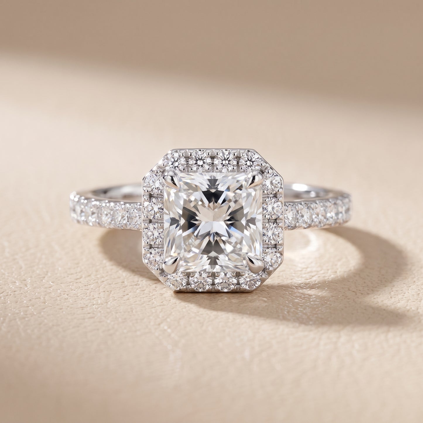 Amara Halo Claw Prong Radiant Diamond Ring in Platinum - front.jpg