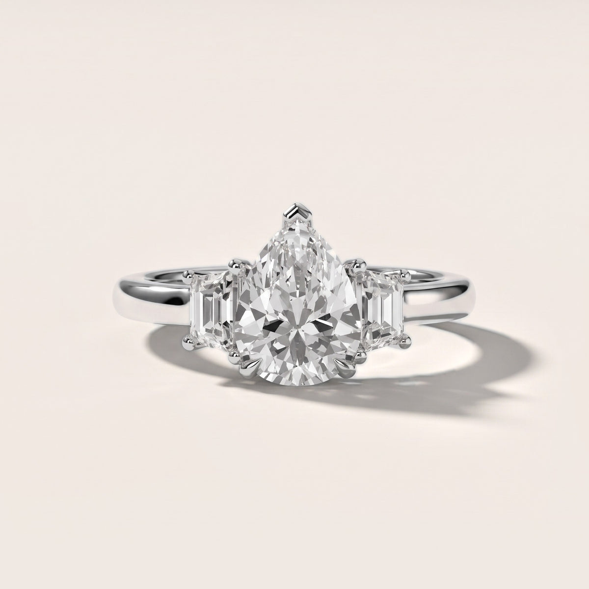 Federica Trapezoid Three-Stone Pear Diamond Engagement Ring in White Gold - front.jpg