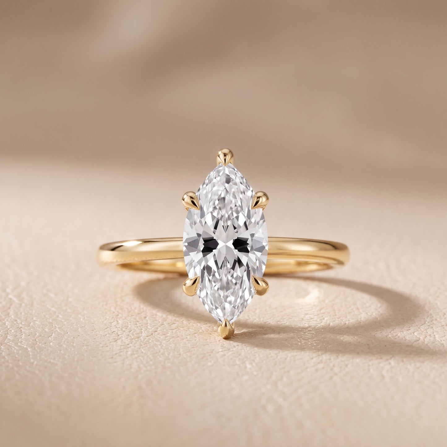 Nella Petite Solitaire Marquise Diamond Engagement Ring in Yellow Gold - front.jpg
