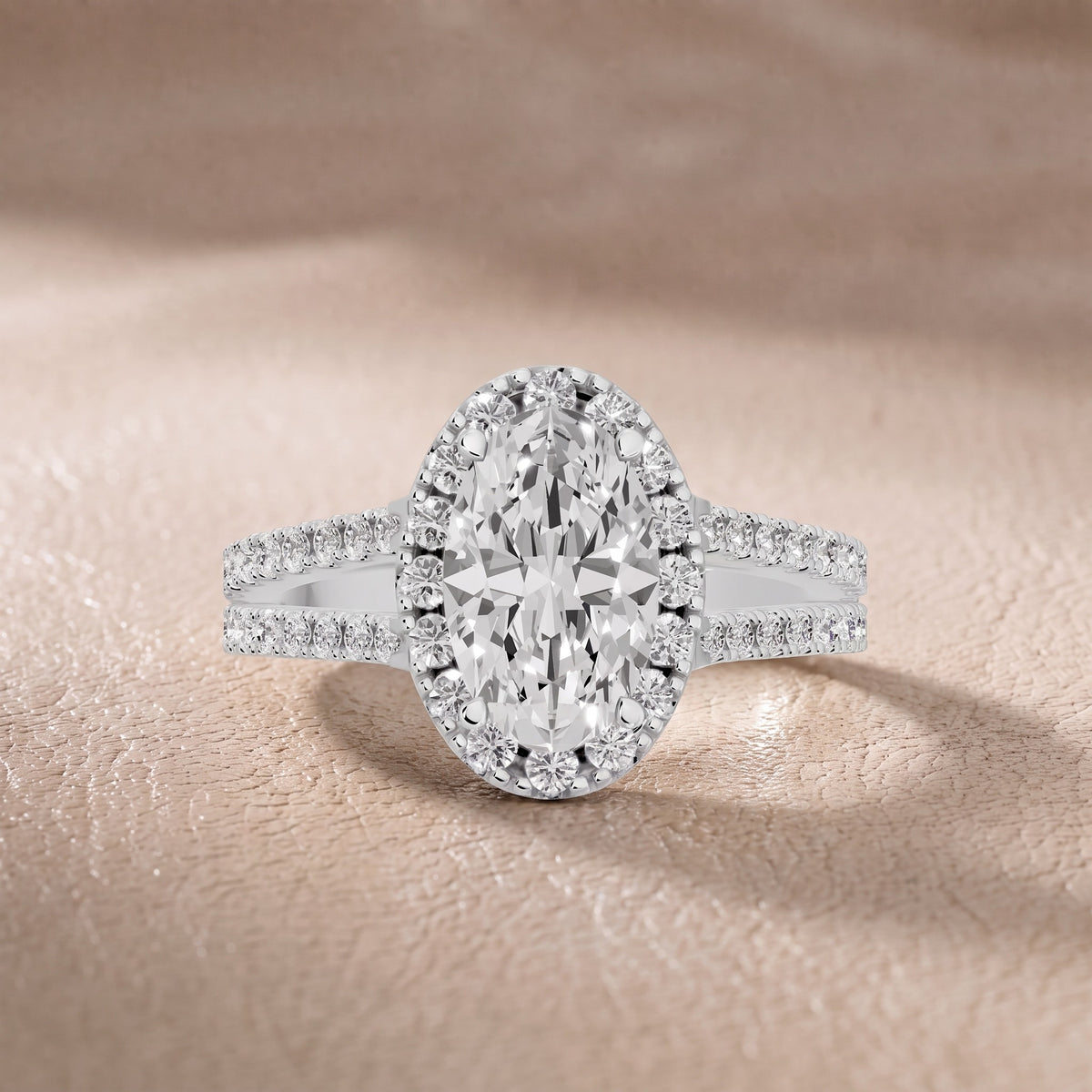 Kira Halo Split Shank Oval Diamond Engagement Ring in White Gold - front.jpg