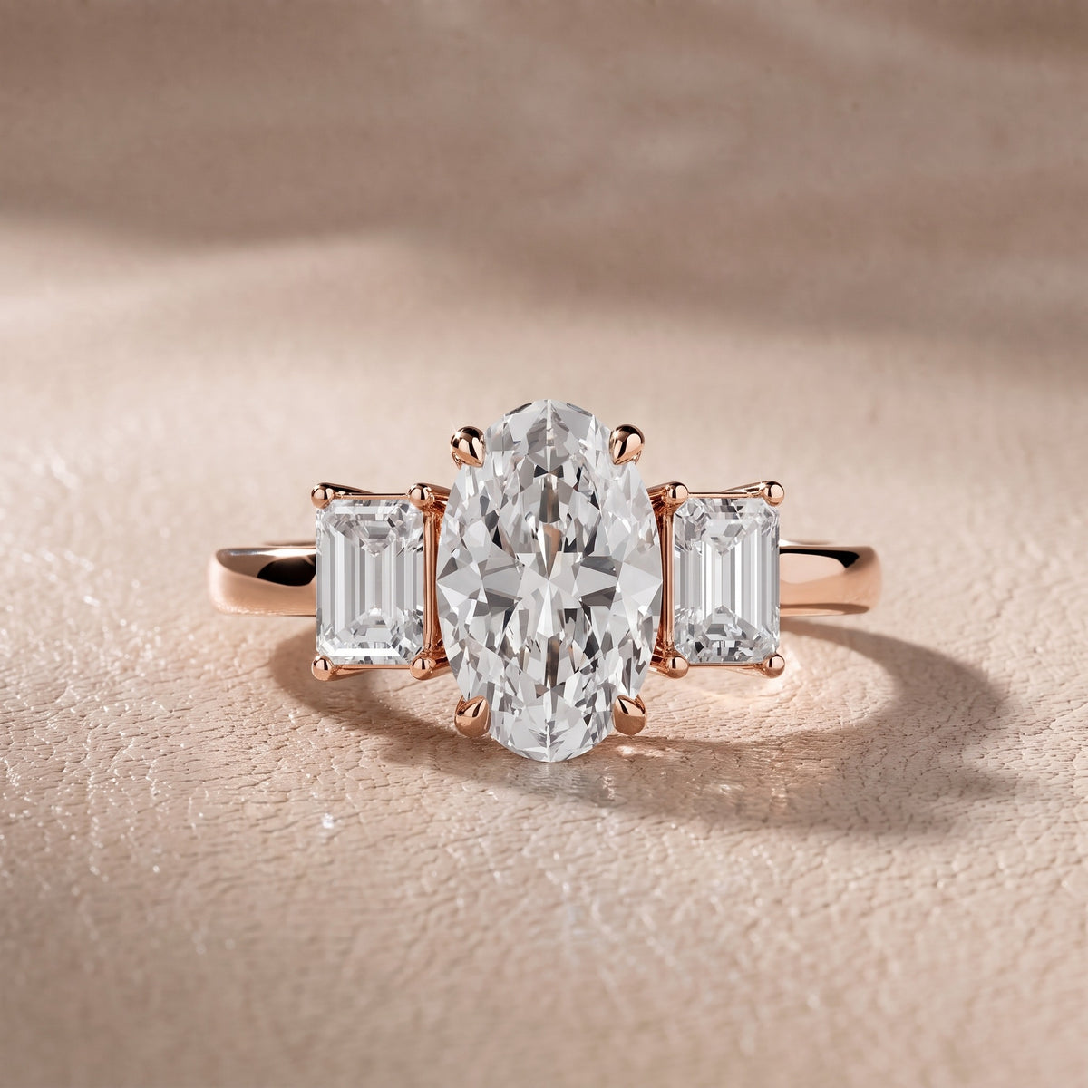 Zoe Three-Stone Oval Diamond Engagement Ring in Rose Gold - front.jpg