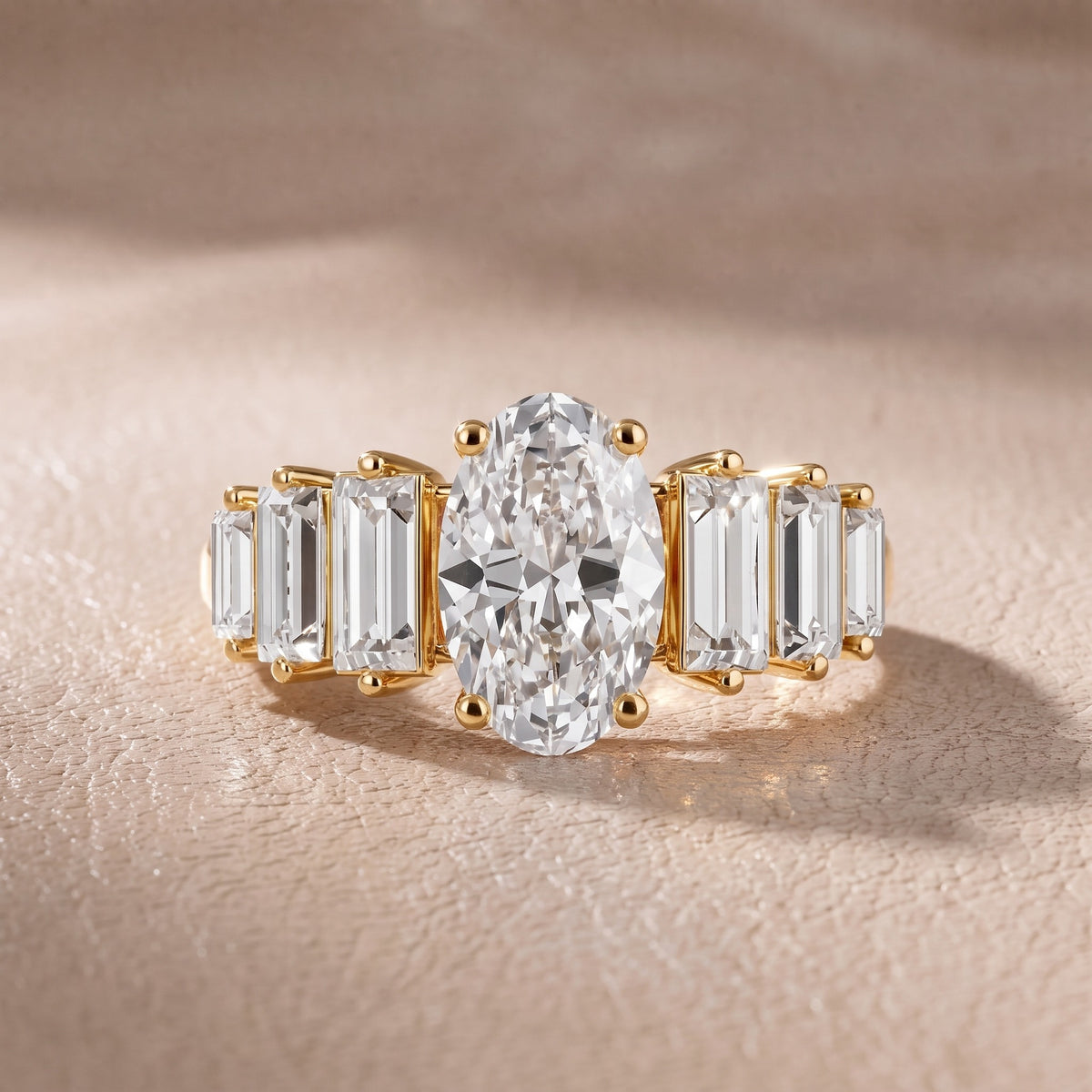 Mara Sidestone Baguette Accent Oval Diamond Engagement Ring in Yellow Gold - front.jpg