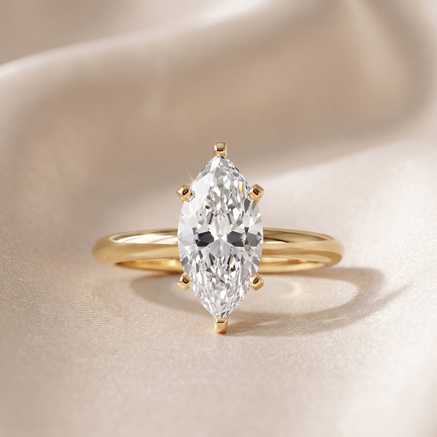 Wren Solitaire Marquise Diamond Ring in Yellow Gold - front.jpg
